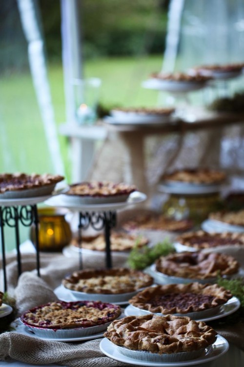 a fall wedding bar with fruit pies is a cool idea for a rustic or any other wedding, it will make guests happy