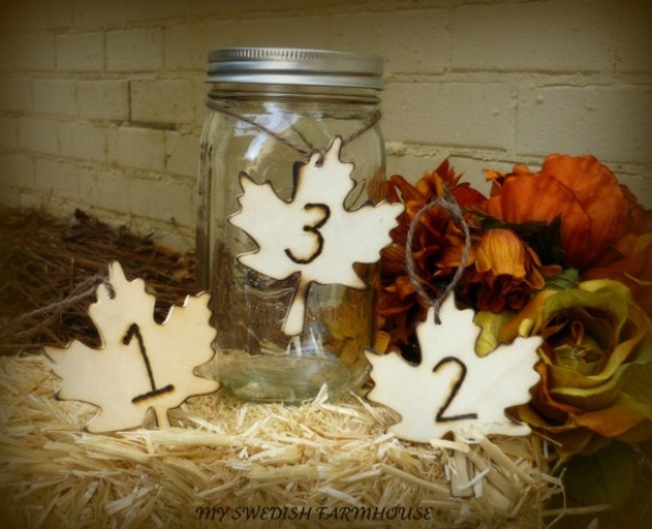 Plywood leaves with numbers are nice items for a fall tablescape and will make your centerpiece catchier