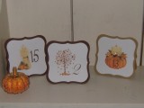 cut out fall cards with leaves, wheat, pumpkins and table numbers will perfectly fit a fall centerpiece