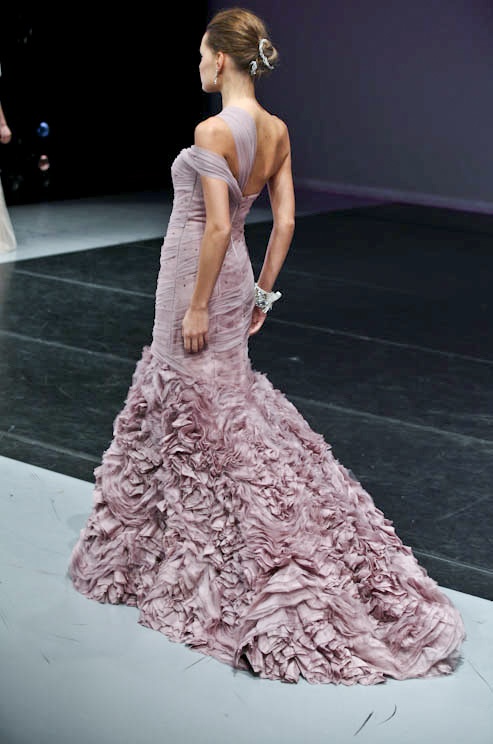 a draped mermaid mauve wedding dress with straps and a layered floral skirt will make a statement