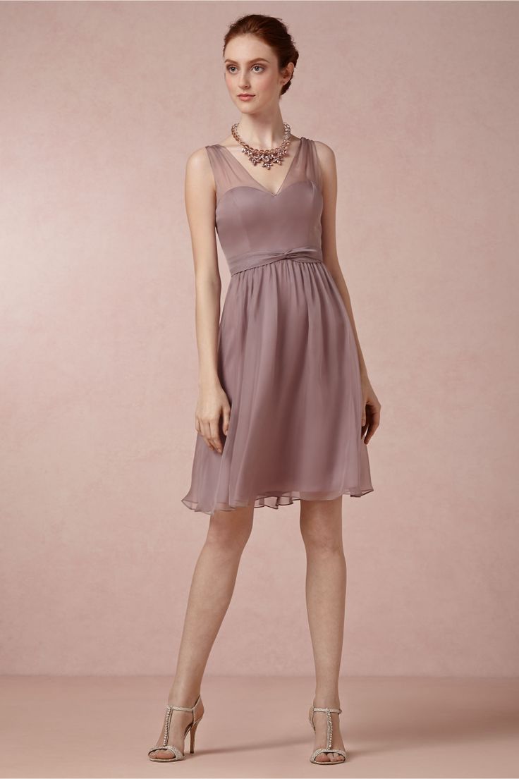 A beautiful mauve chiffon knee bridesmaid dress with a statement necklace is a nice idea for styling your gals