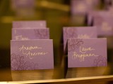 mauve cards with gold calligraphy and botanical decor for your wedding