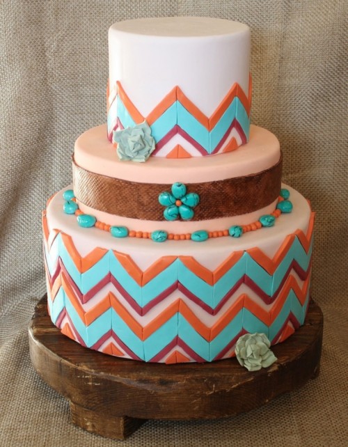a colorful geometric tier wedding cake with bright pebbles of sugar, beads and sugar blooms for a mid-century boho feel