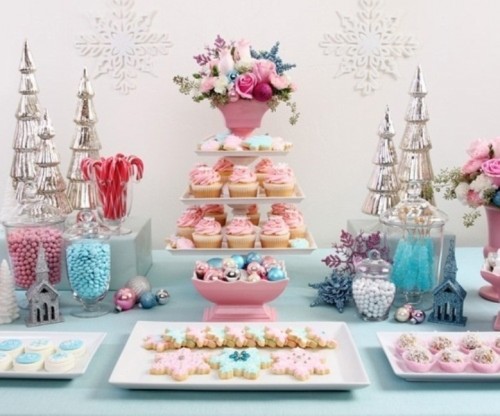 a pastel winter wedding can be complemented with a pastel dessert table in pink and blues, looks unusual and bright