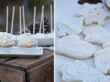 cookies with white icing and some cupcakes with icing and marshmallows on top are great for a frozen or snowy winter wedding