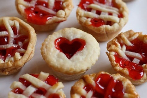 mini pies with hearts on top and with cherry or strawberry jam are very heart-warming for a cold winter wedding