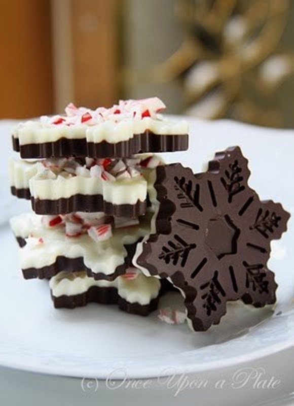 dark and white chocolate snowflakes with peppermints on top are amazing for a wedding dessert table and as wedding favors