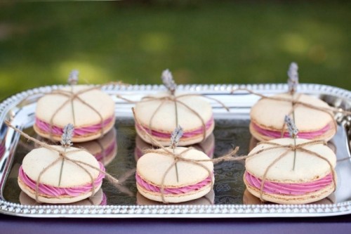 neutral and pink macarons topped with lavender are great wedding desserts or lovely wedding favors