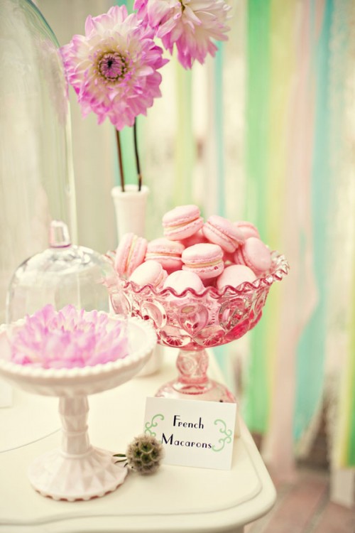 serve mini macarons in a pink glass bowl to make your wedding sweeter and cooler
