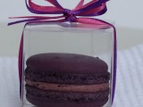 a chocolate macaron in an individual pack with a purple bow on top is a pretty idea for a modern wedding, it will make a cool favor