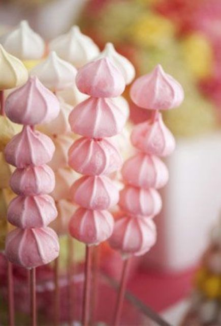 pink meringue kisses on skewers are lovely and easy desserts and can be given as wedding favors, too