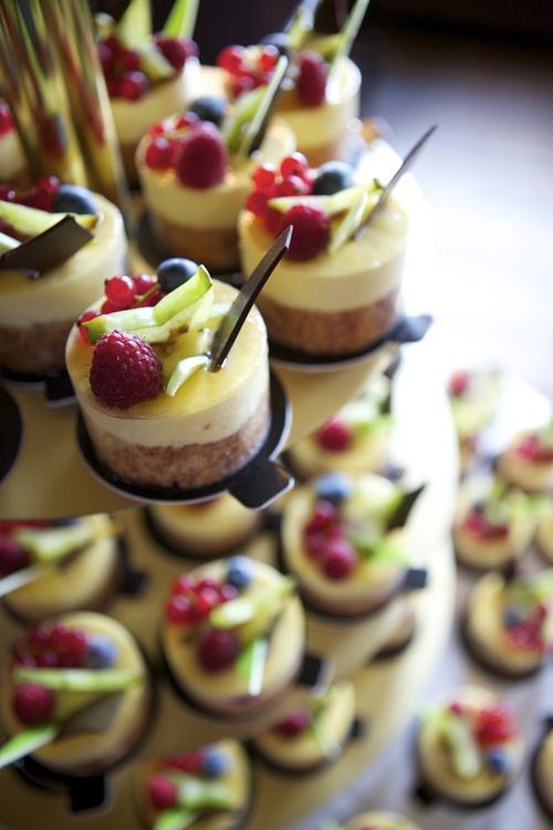 mini cheesecakes with fresh berries, zest and chocoalte shards on top are delicious and look chic