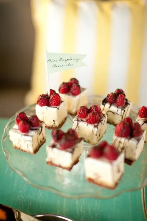 mini raspberry cheesecakes topepd with fresh berries are amazing, delicious and not too sweet