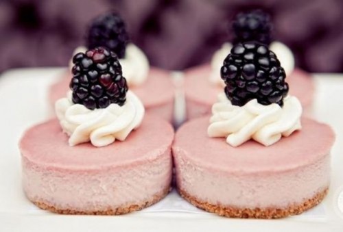 mini berry cheesecakes with whipped cream and fresh blackberries on top are crowd-pleasing, fresh and tasty