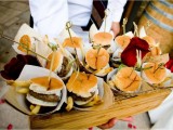 mini burgers with French fries by their side is a casual appetizer option for any wedding