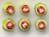 cucumber slices stuffed with fresh tomatoes and some onions will make all the vegetarians and carnivore guests happy