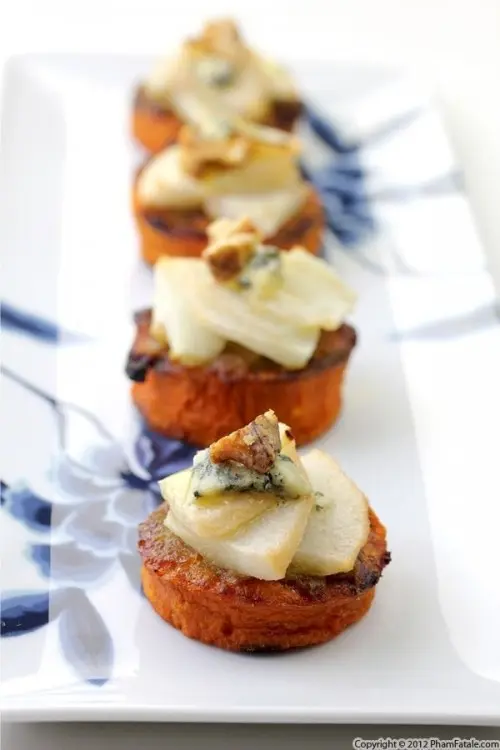 baked veggies topped with pears, cheese and nuts are a hearty appetizer