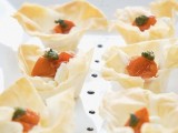 baked cups with feta cheese and sun dried tomatoes are hearty summer wedding appetizers