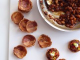 bacon cups fileld with beans, pepper and greenery on top
