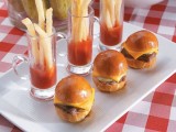 mini sliders and French fries put into glasses with ketchup is a simple and cool idea, add beer
