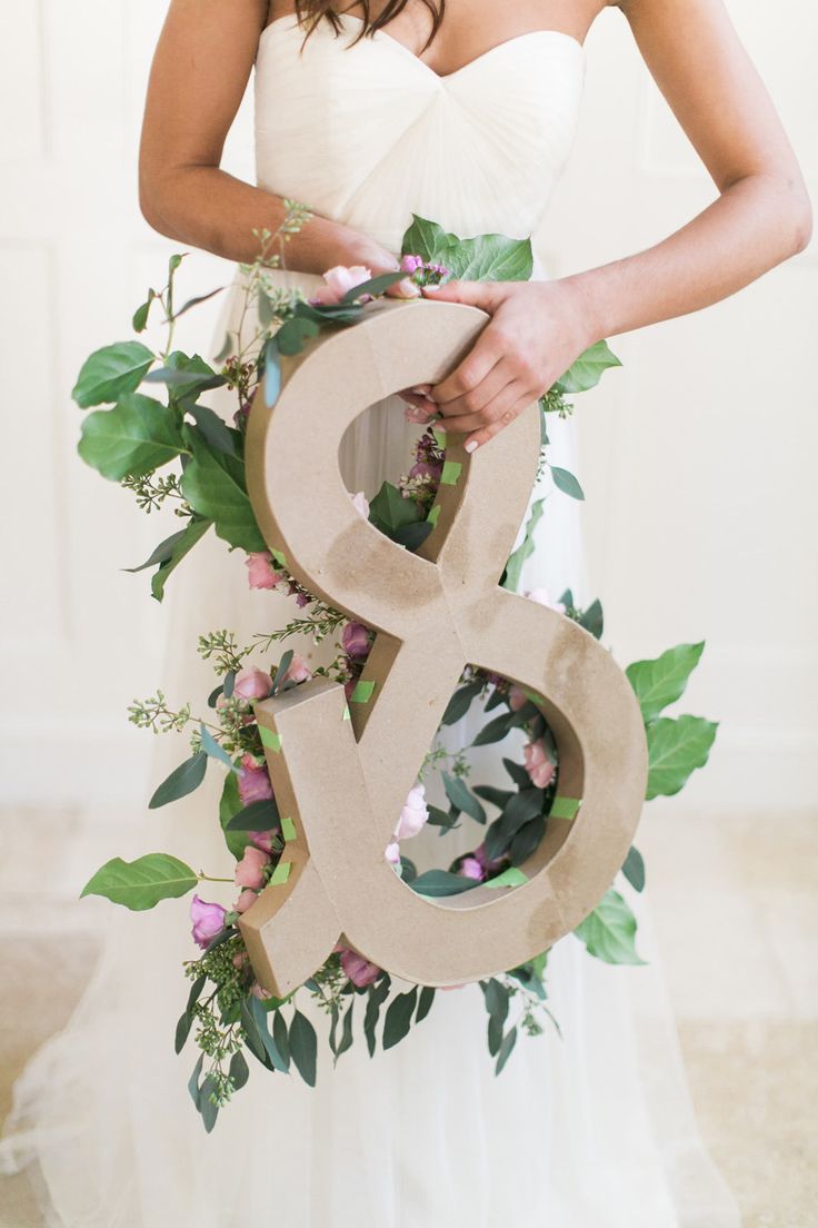 Picture Of diy ampersand from fresh flowers and greenery  3