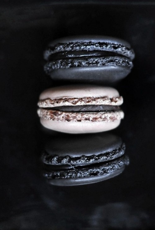chic black and white macarons can be a nice dessert or favor idea for a soft gothic wedding