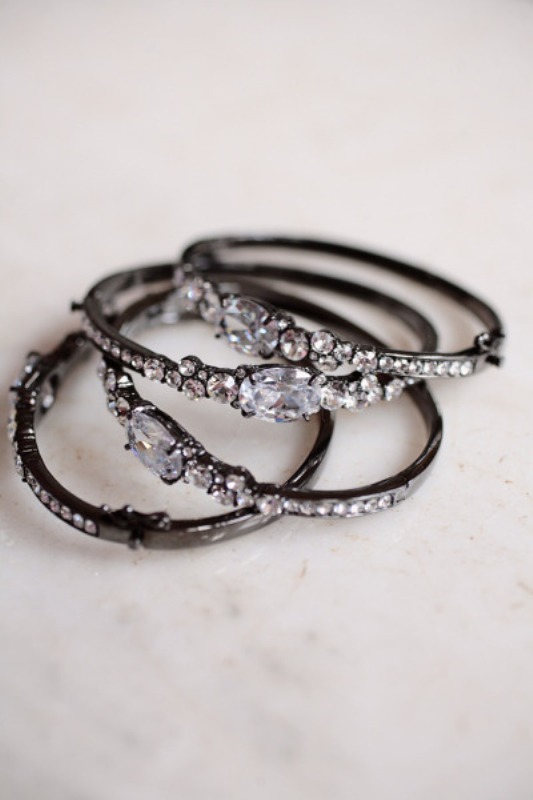 Multiple black rhinestone bracelets are a nice bridesmaid favor or bridal accessories for a soft gothic wedding