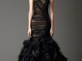 a black mermaid wedding dress with no sleeves and a wrapping effect for a soft gothic bride