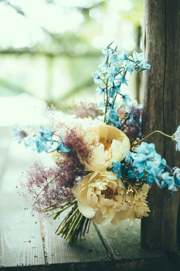 A pastel wedding bouquet in powder blue, pink, muted yellow looks very unusual and fits a spring boho bride