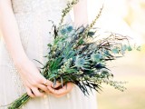 a greenery, thistle, eucalyptus wedding bouquet for a spring or summer boho bride