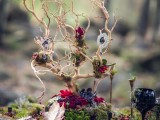 a catchy woodland wedding centerpiece of branches, moss, blooms will be ideal for the fall