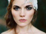 a white fabric floral headband with rhinestones and lace is a beautiful option for an art deco or vintage bride
