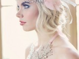 a heavily embellished headband with pink fabric blooms and a matching statement necklace for an art deco look