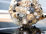 a sparkling brooch wedding bouquet done in black, white and gold