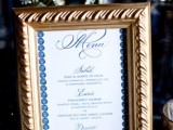 a gold frame with navy and white printing to match the gold navy and gold theme