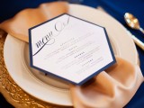 a chic navy, gold, white and blush place setting