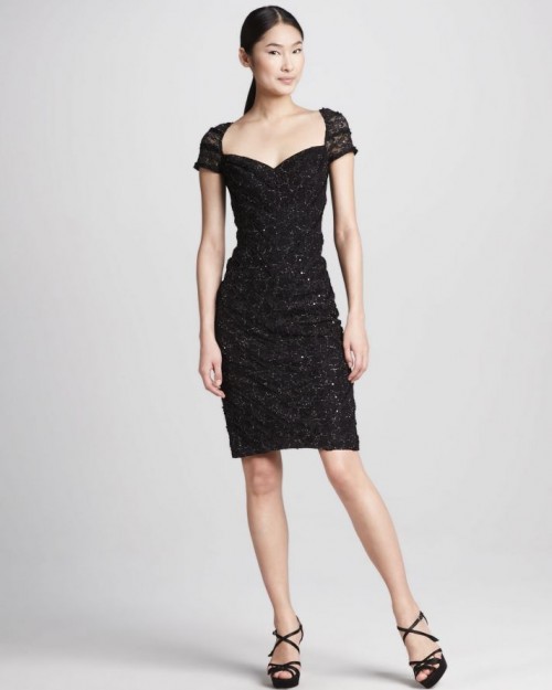 a black embellished over the knee dress with a deep neckline and cap sleeves is a very refined and chic idea to rock