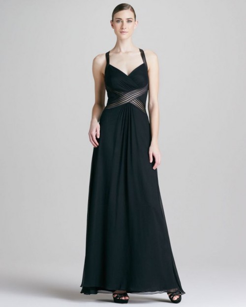 a black A-line maxi dress with thick straps and striped accents on the waist is a very chic and laconic idea to rock