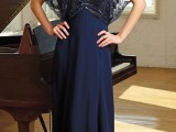 a bold navy maxi dress with an embellished bodice and sleeves plus a V-neckline, statement accessories