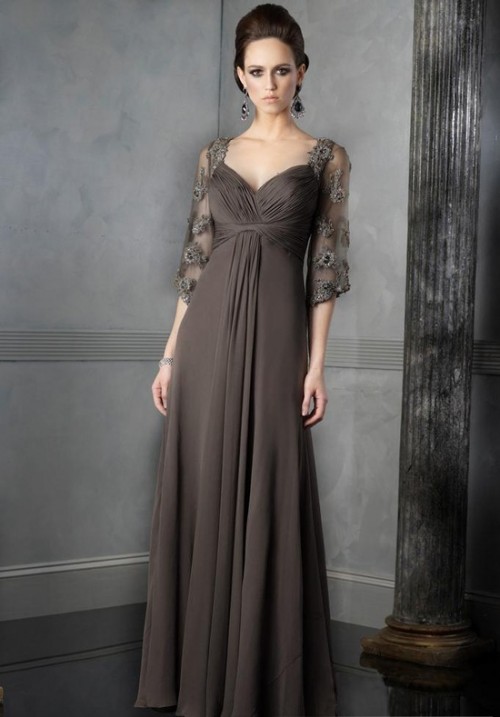 a grey A-line maxi dress with a draped bodice and embellished sleeves, a pleated skirt and a deep neckline is a chic statement
