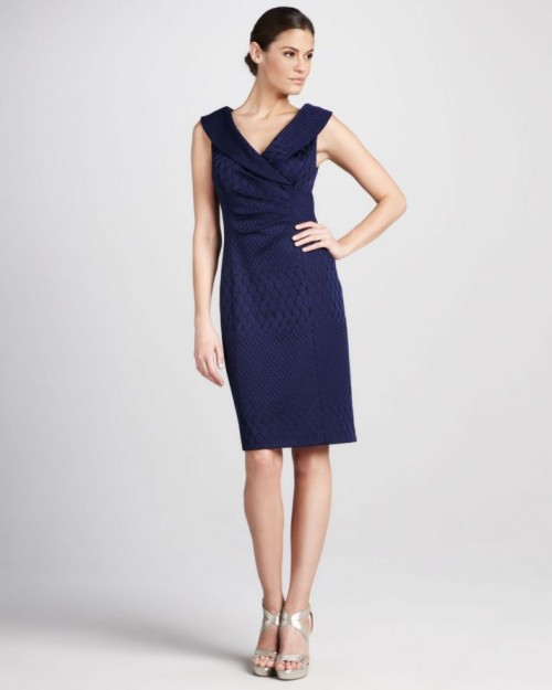 an elegant navy textural and draped knee dress with thick straps and no sleeves plus a deep V-neckline is a very stylish option