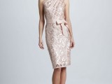 a blush lace fitting one shoulder knee dress with a bow and strappy silver shoes will make the look super refined