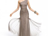 a grey one shoulder lace fitting maxi dress with a slight overskirt and fringe is a super elegant and refined idea to rock