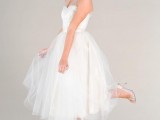 a tea length A-line wedding dress with an illusion neckline, silver shoes for a modern and fun wedding look