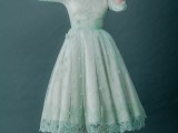 a mint green tea length lace A-line wedding dress with short sleeves, a high neckline and grey vintage shoes just wows