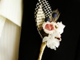 a vintage wedding boutonniere of fabric blooms, paper and mesh leaves and faux berries is a stylish vintage accessory for a wedding