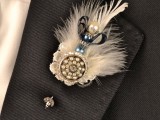 a gorgeous and refined vintage wedding boutonniere of a feather, some pearls and beads and a vintage brooch is a lovely idea to go for