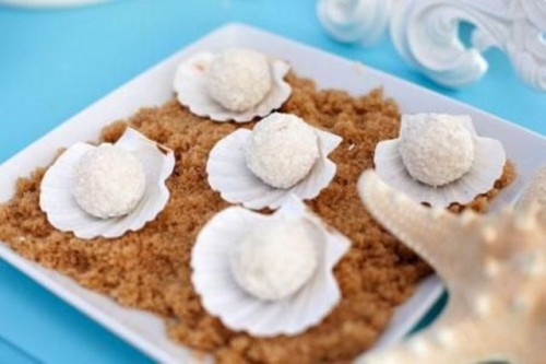 white chocolate candies in seashells are nice beach bridal shower desserts