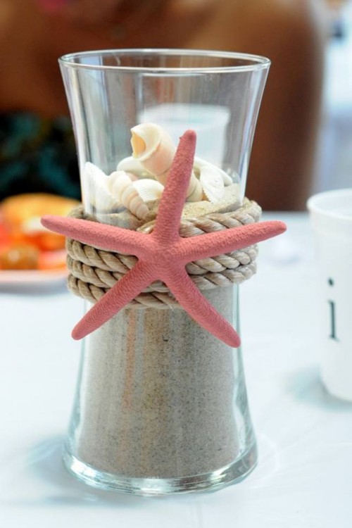a beach bridal shower decoration of a glass with rope and a stafish plus seashells is a cool idea