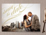 a large save the date wedding magnet styled as a card with a photo from the couple’s engagement photo shoot